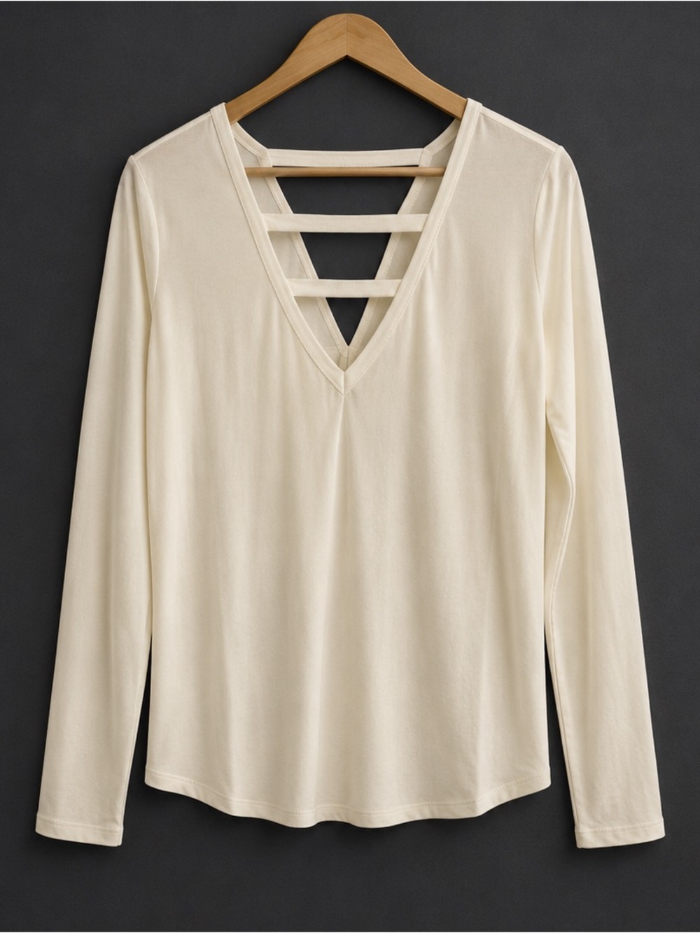 Marika Women's Cream Long-sleeve tee featuring strappy back design